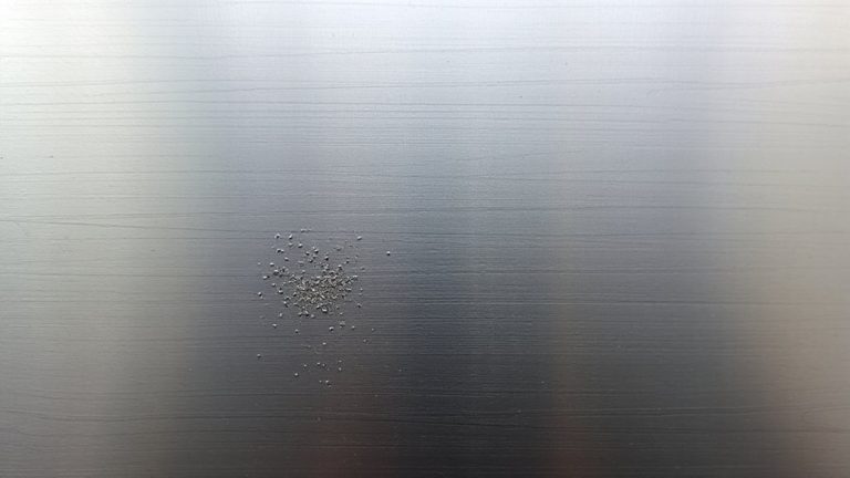ferrous content limits for refinishing
